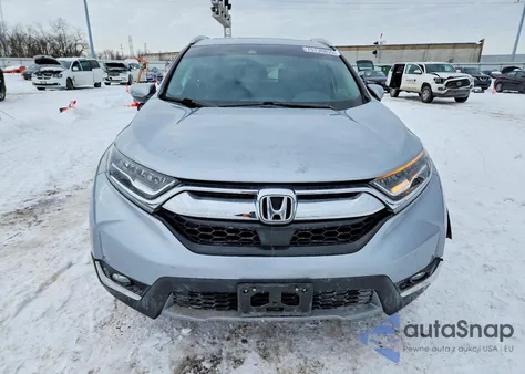 2019 Honda Cr-V Touring z USA, uszkodzony, nr VIN 7FARW2H94KE005280